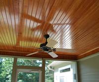 beautiful wood ceiling with fan on custom deck