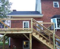2 story deck on brick home