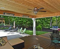 custom deck space with ceiling fans