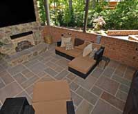 custom outdoor deck with fireplace